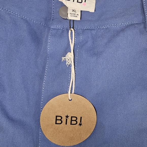 BiBi Blue Boot-Cut Pants with Multicolor Flower Motifs - Picture 12 of 12